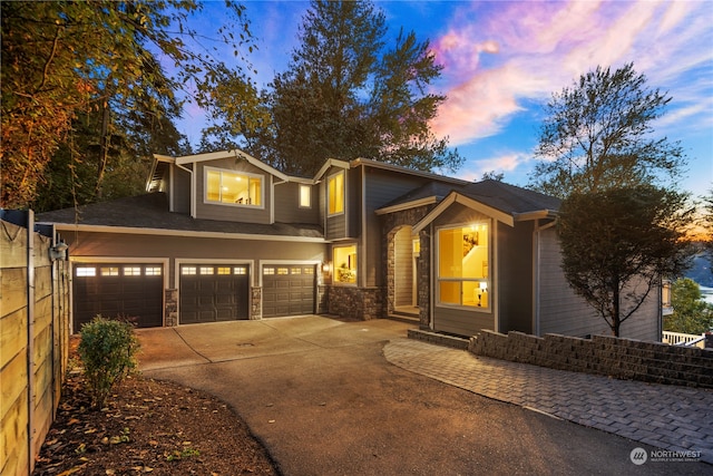 view of front of property with a garage