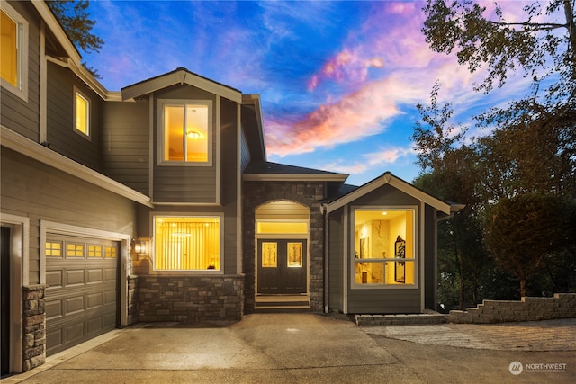 view of front of house featuring french doors and a garage