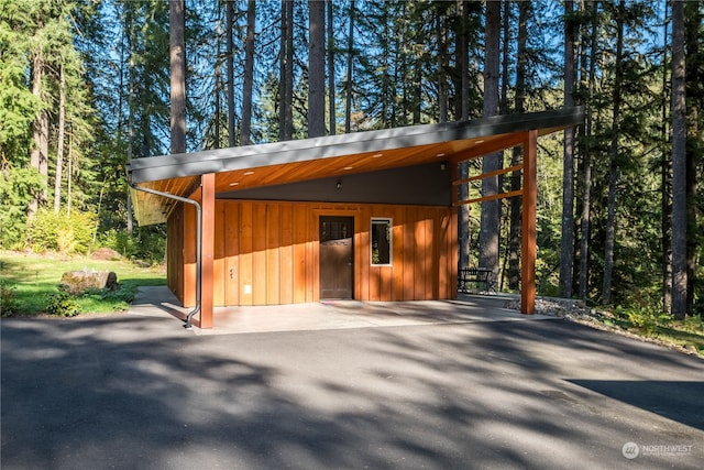 view of outdoor structure with a carport