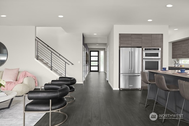 living room featuring dark hardwood / wood-style flooring