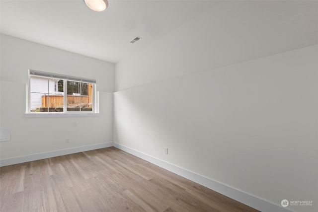 empty room featuring light hardwood / wood-style floors