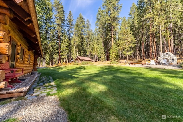 view of yard featuring a view of trees