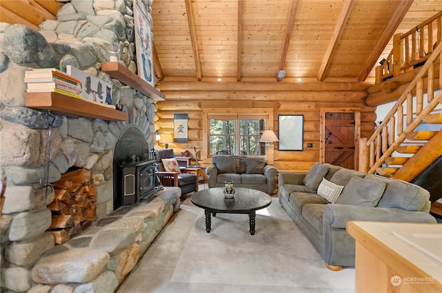 living room with rustic walls, beam ceiling, wood ceiling, a wood stove, and high vaulted ceiling