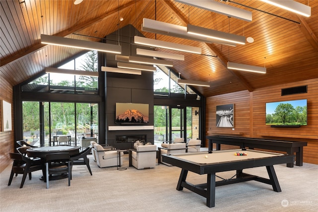 recreation room featuring a large fireplace, light carpet, wood ceiling, and wood walls