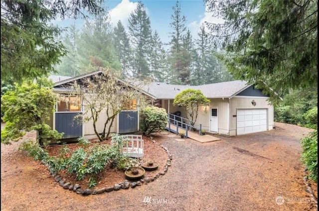 ranch-style home with a garage