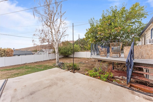 view of patio with a wooden deck