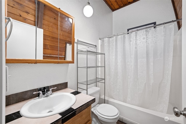 full bathroom featuring shower / bath combination with curtain, vanity, and toilet