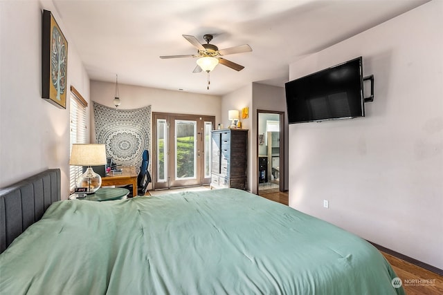 bedroom featuring access to exterior, hardwood / wood-style flooring, and ceiling fan