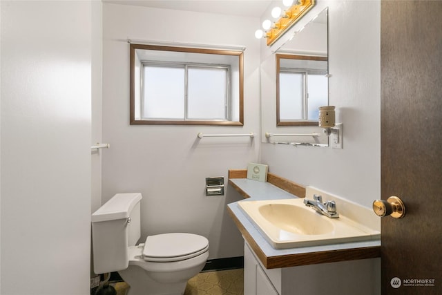 bathroom featuring sink and toilet