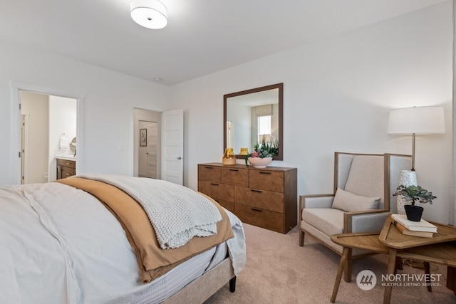 carpeted bedroom with ensuite bathroom