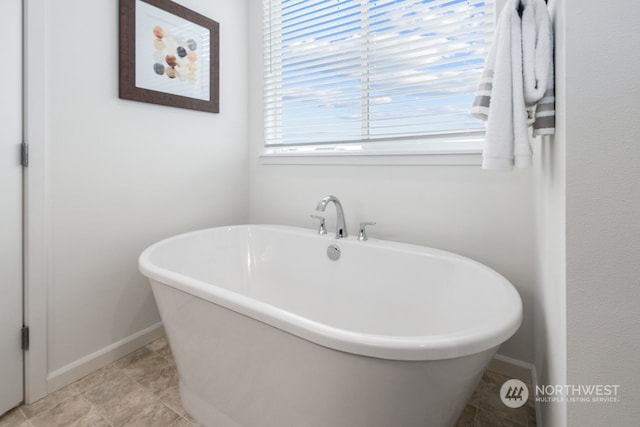 bathroom featuring a bath