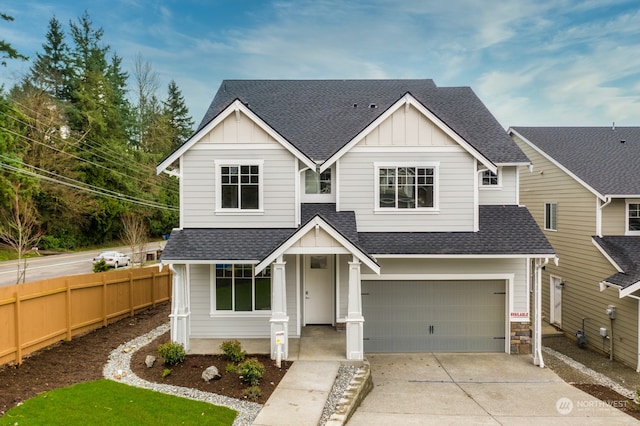 craftsman house with a garage