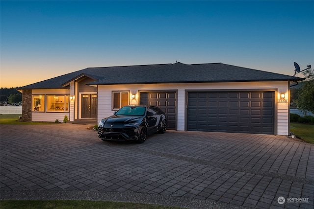 view of front of home with a garage