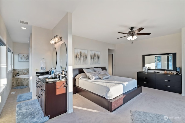 1558 Fairview St, Bellingham, WA 98229 - bedroom featuring multiple windows, connected bathroom, a ceiling fan, and recessed lighting