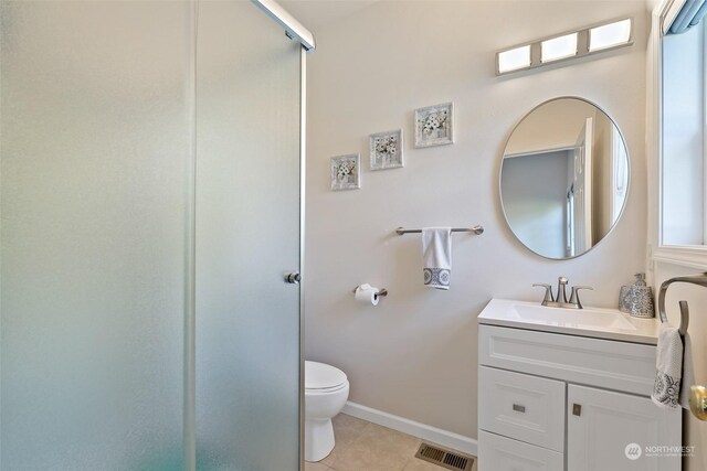 1558 Fairview St, Bellingham, WA 98229 - bathroom with tile patterned floors, a stall shower, vanity, baseboards, and toilet