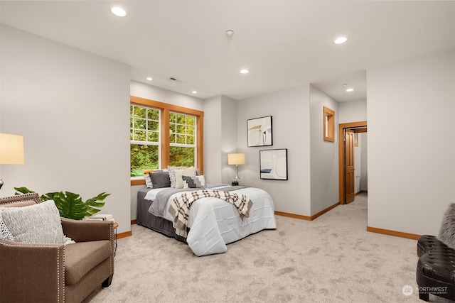 bedroom with light carpet