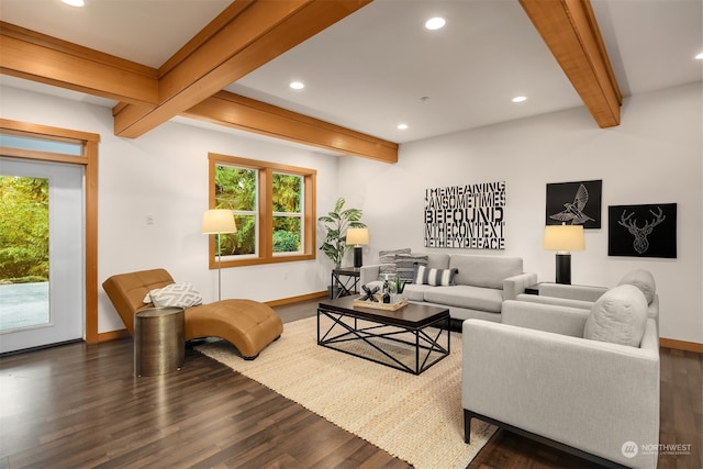 living room featuring beamed ceiling and dark hardwood / wood-style flooring