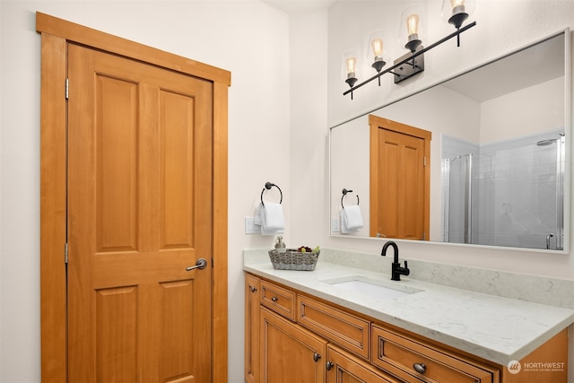 bathroom with vanity and walk in shower