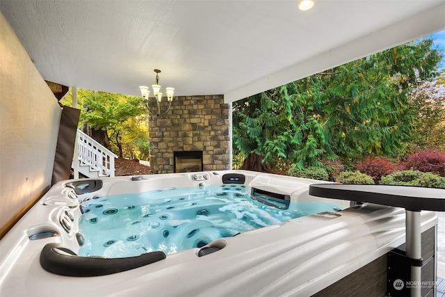 view of patio with a hot tub