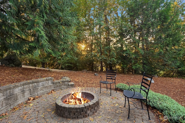 view of patio / terrace with a fire pit