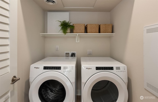 laundry area with washer and dryer