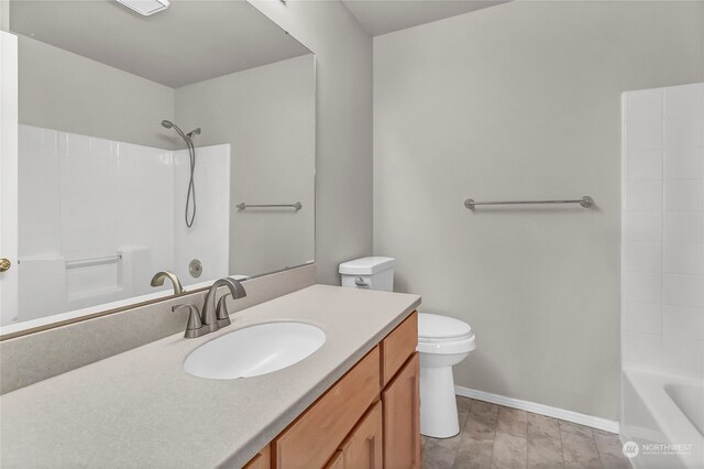 full bathroom featuring vanity, toilet, and  shower combination