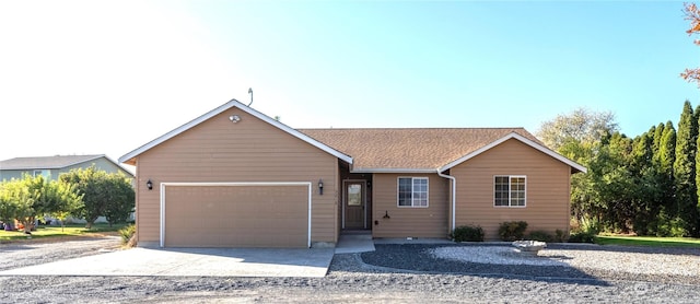 ranch-style home with a garage