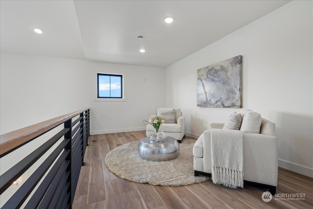 sitting room featuring wood-type flooring