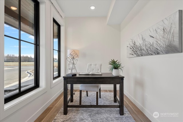 office area with hardwood / wood-style floors