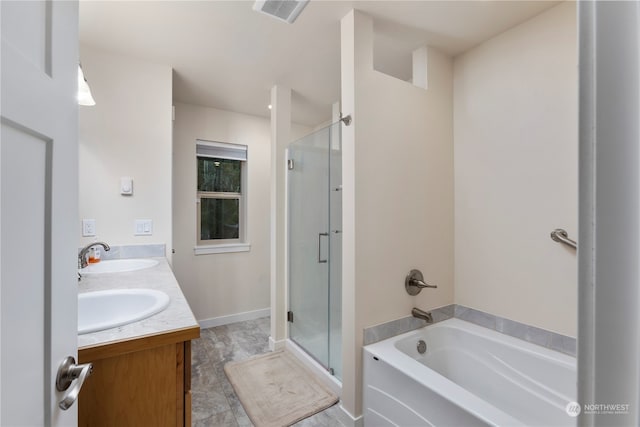 bathroom with vanity and separate shower and tub