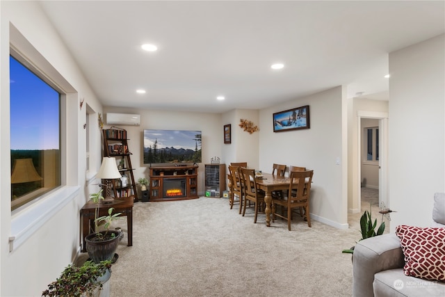 carpeted dining area with an AC wall unit and a fireplace