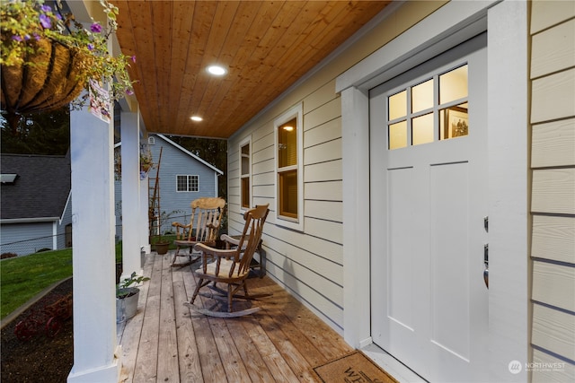 deck with covered porch