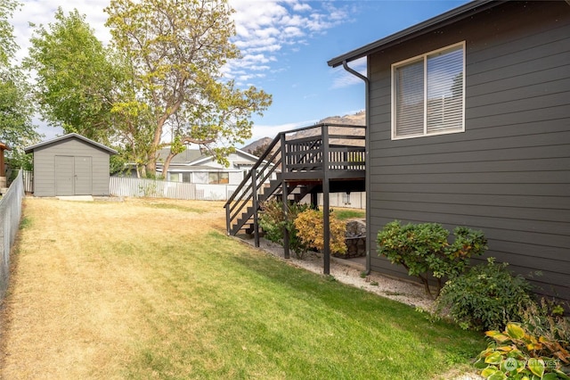 260 Chestnut St, Chelan Falls, WA 98817 - view of yard with a shed, a fenced backyard, stairway, and a deck