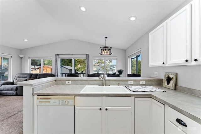 260 Chestnut St, Chelan Falls, WA 98817 - kitchen featuring vaulted ceiling, a sink, open floor plan, dishwasher, and a peninsula