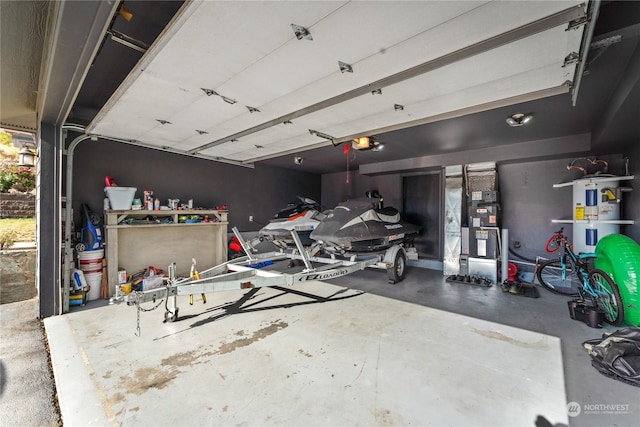 260 Chestnut St, Chelan Falls, WA 98817 - garage with water heater and a garage door opener
