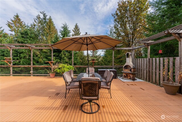 wooden terrace with a pergola