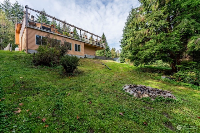 view of yard featuring a balcony