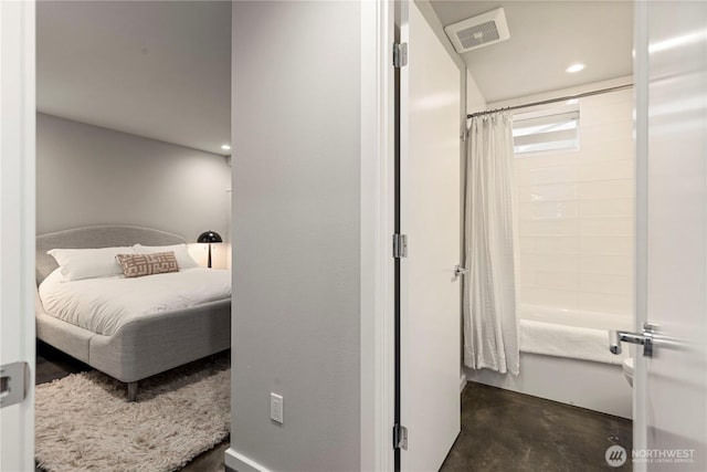 bedroom with concrete floors, visible vents, and recessed lighting