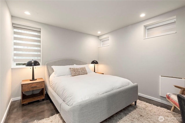 bedroom with baseboards and recessed lighting