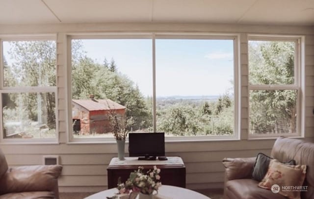 sunroom / solarium featuring a wealth of natural light