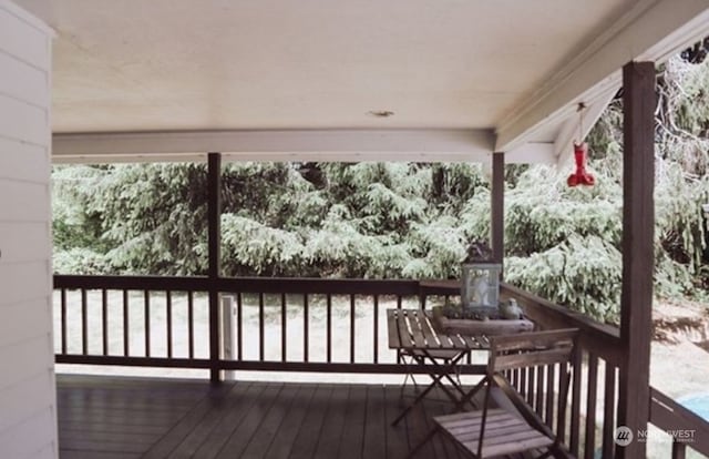 view of snow covered deck