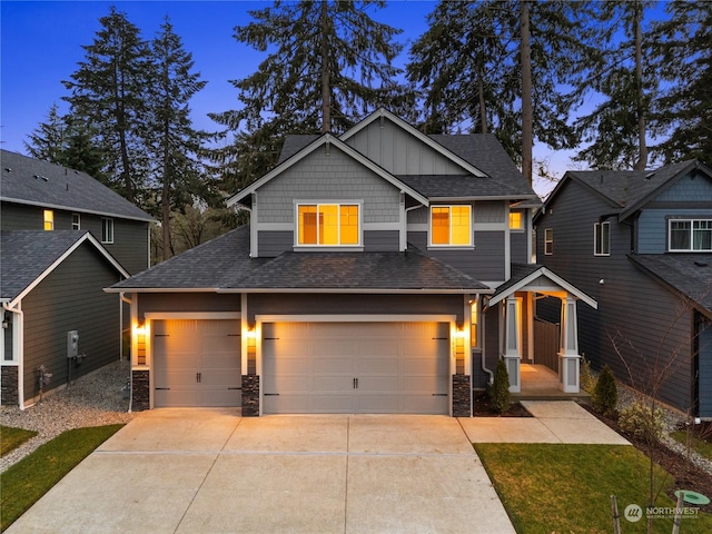 craftsman inspired home with a garage