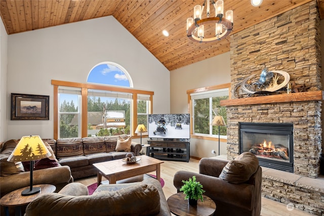 living room featuring light hardwood / wood-style flooring, high vaulted ceiling, and wooden ceiling