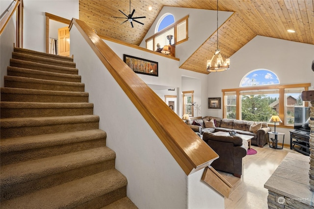 261 Tiger Lily Ln, Ronald, WA 98940 - stairs featuring high vaulted ceiling, wood ceiling, a chandelier, plenty of natural light, and a ceiling fan