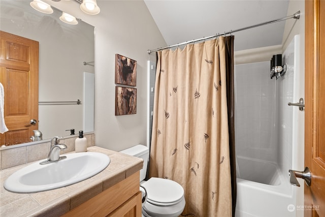 bathroom with shower / tub combo with curtain, vanity, and toilet