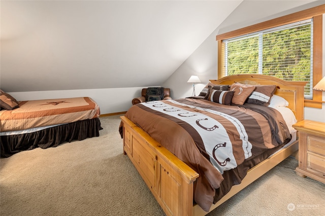 bedroom with light carpet and vaulted ceiling