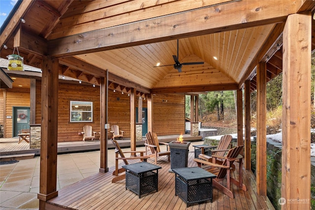 261 Tiger Lily Ln, Ronald, WA 98940 - wooden deck with a fire pit, ceiling fan, and a patio area