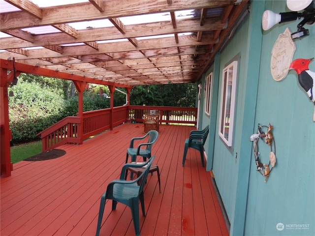 wooden deck with a pergola