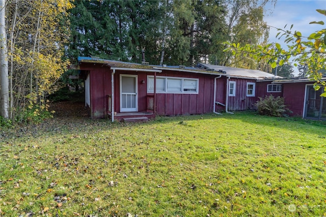 exterior space featuring a front lawn