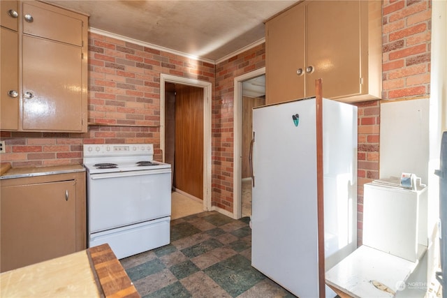 781 Irondale Rd, Port Hadlock, WA 98339 - kitchen with light countertops, brick wall, and white appliances